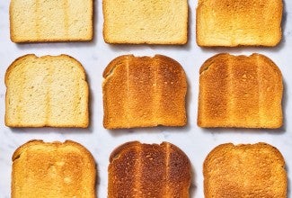 Slices of toast next to each other, each a different color of bake 